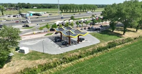 Fast charging of EV along the highway in the Netherlands. Stock Footage 246072403