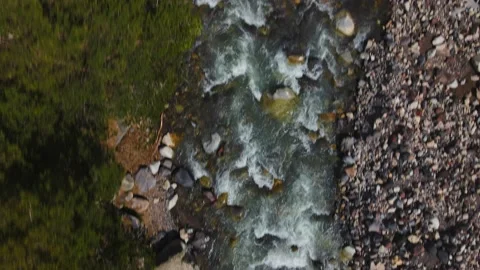 Fast Clear Stream of Mountain River with Pebbles on Shores. Aerial View Stock Footage 157927288