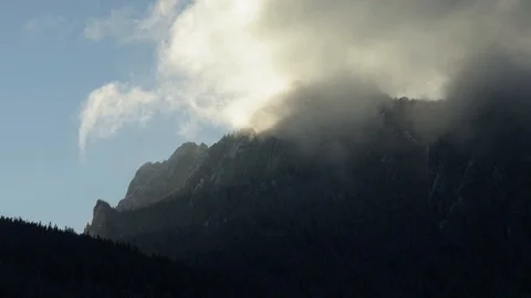Fast clouds and mist into the mountain Stock Footage 85700980