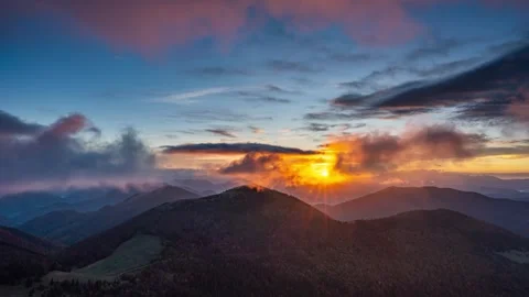 Fast clouds in Carpathians mountains beautiful nature in autumn morning sunrise Stock Footage 257678432