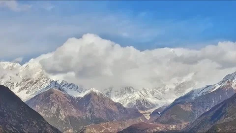 Fast Clouds Moving over Mount Namcha Barwa Peak in Tibet. Stock Footage 330383717