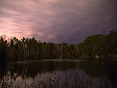 Fast Clouds at Night over Lake Stock Footage 80090473