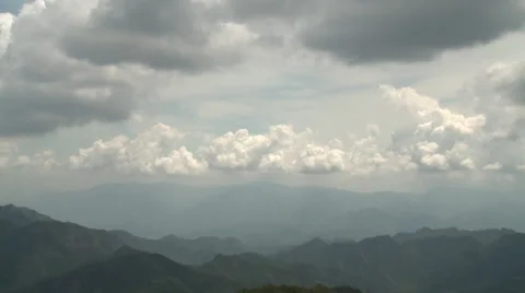 Fast clouds over Chinese mountains Stock Footage 58607027