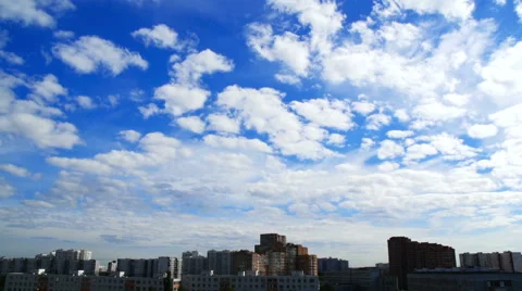 Fast clouds over the houses Stock Footage 54563228