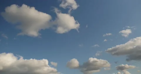 Fast clouds passing by on a sunny day. Stock Footage 133006930