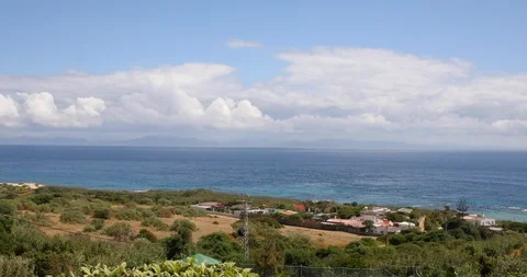 Fast clouds in Strait of Gibraltar and Africa from Spain Stock Footage 91008992