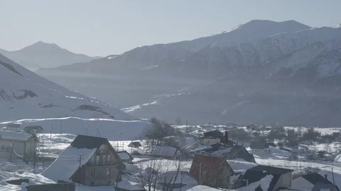 Fast clouds in winter mountains at sunrise time-lapse Stock Footage 104139586