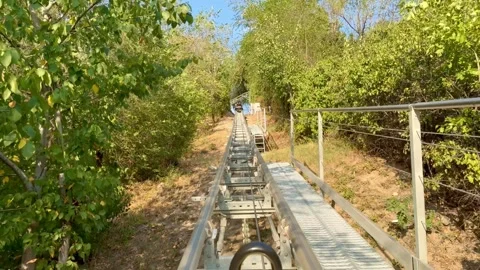 Fast Coaster ride through green mountains near Almaty Kazakhstan in 4K Stock Footage 343376242
