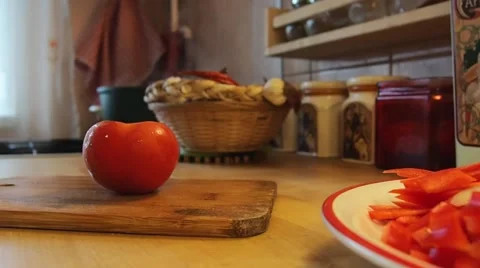 Fast cooking, cutting tomatoes Stock Footage 67354634