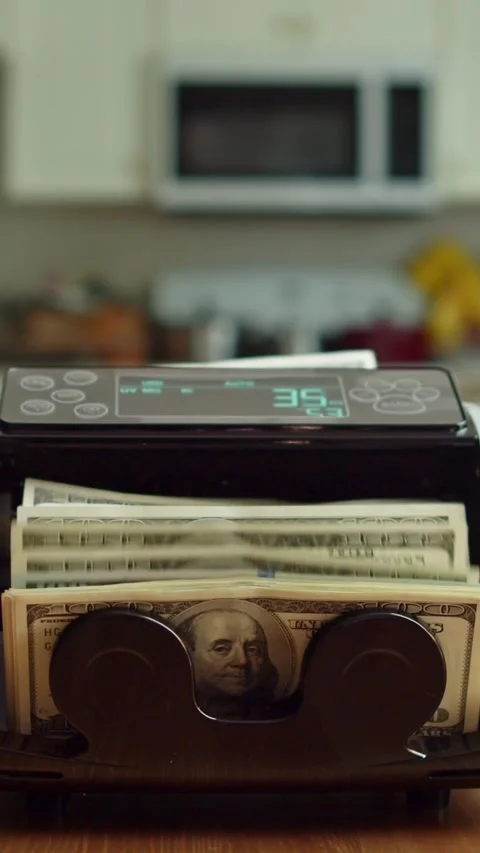 Fast Counting Of U.S. Bills By Automatic Machine For Accurate Financial Records Video stock 315686957