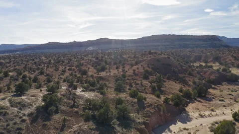 Fast descending aerial shot at Devil's Garden flying down towards desert 스톡 동영상 248558701