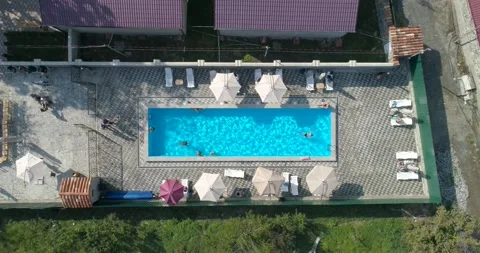 Fast down flight shot on swimming pool Stock Footage 155336508
