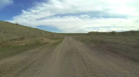 Fast driving on a bad road Stock Footage 38090541