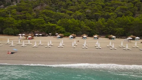 Fast drone flight over the beach Kidrak Paradise Beach in Oludeniz Turkey Video stock 216559777