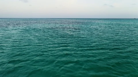 Fast drone flight over the ocean with coral reefs Stock Footage 124918902