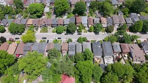 Fast drone flight over suburban neighbourhood. Green trees. Toronto. 4K. Stock Footage 295312642