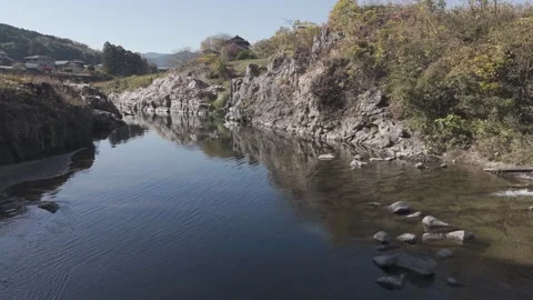Fast Drone Flight Upstream Through Rocky River Canyon – Aerial Nature 4K Stock Footage 325411274