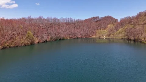 Fast Drone Flyover Above Crystal Blue Lake in 4K Stock-Footage 339064553