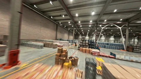 Fast drone FPV flight in logistic center. Speed motion view of industrial 스톡 동영상 165416254