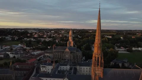 Fast Drone Passing Two Church Spires Golden Light Vidéo 331661527
