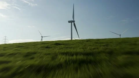 Fast drone speed footage of wind turbines shot in 4K Stock Footage 179323989