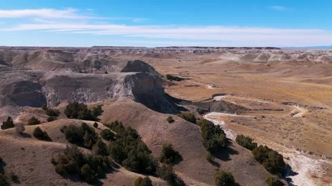 Fast drone view of badlands bluffs Stock Footage 304807616