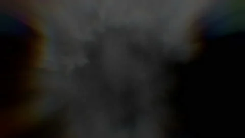 A fast explosion with chromatic aberrations around the edges of the thick smoke. Stock Footage 239703819