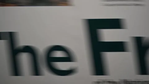 Fast eye-tracking macro scan across 1999 railway museum brochure headlines Stock Footage 345506428