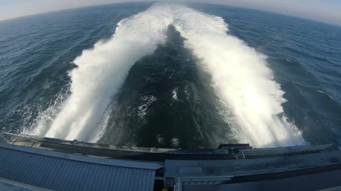 Fast ferry sails fast across the sea and makes big waves Stock Footage 98101540