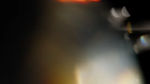 Fast flashing prism light leaks transition on a black background Stock Footage 345518445