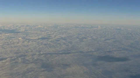 Fast flight abobe spectacluar clouds, travelling by air Stock Footage 64092501