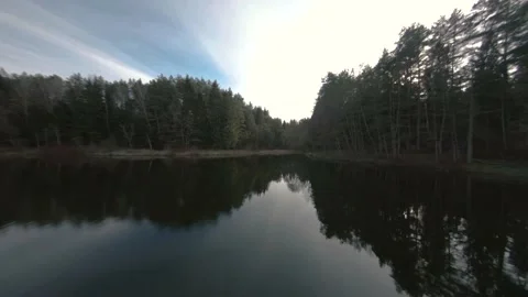 Fast flight on a drone over a lake near the water Stock Footage 167428153
