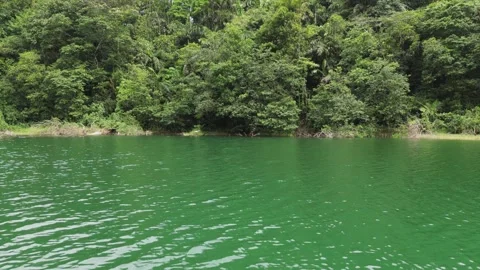 Fast flight of a drone over a mountain lake. Stock Footage 278771730