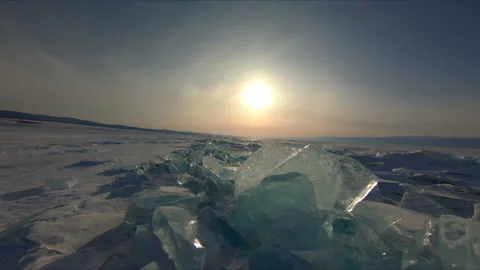 Fast flight on an FPV drone over the frozen Lake Baikal. Hummocks Stock Footage 170760792