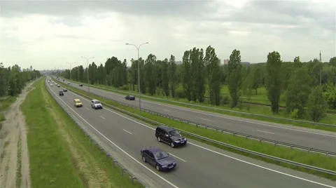 Fast  Flight at low height along  highway. Aerial top view Stock Footage 38655780