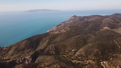 Fast flight on a mountain towards the sea Stock Footage 105243097