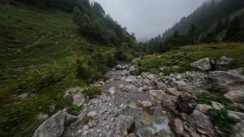 Fast flight over mountain trekking river hiking adventure and nature drone view Stock Footage 227880237