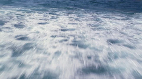 Fast flight over ocean waves, paralleling shoreline cliffs Stock Footage 59508202