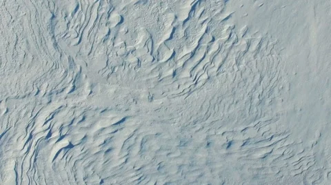 Fast flight over snow desert in winter, aerial top view. 動画素材 67759226