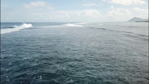 Fast flight over waves in Mauritius Stock Footage 113476788