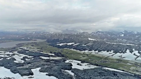 Fast flight over winter landscape with snowy mountains. Austria, Europe Stock Footage 84952250
