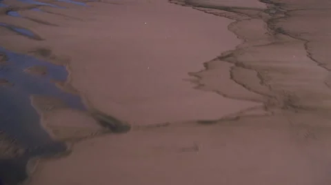 Fast flight paralleling beach with tidelines Stock Footage 59508189