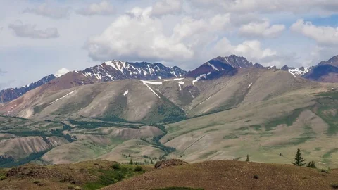 Fast floating clouds over the mountain. Stock Footage 77001997