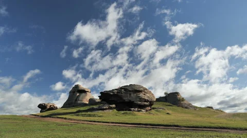 Fast floating clouds over stone cliffs Видео 146892401