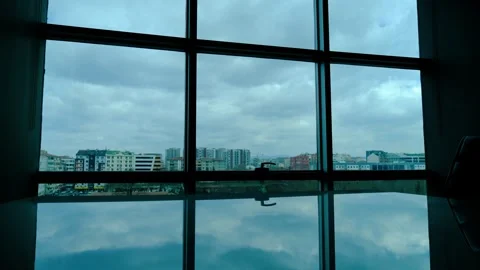 Fast flow of clouds in the sky outside from the office window Stock Footage 270151217