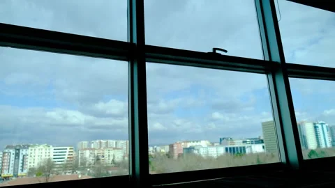 Fast flow of clouds in the sky outside from the office window Stock-Footage 270152335