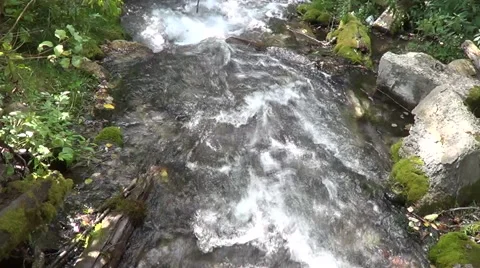 The fast flow of a mountain river in the rocks Stock-Footage 53896767