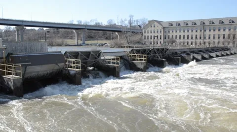 Fast flow of water through barrage Stock Footage 55484981