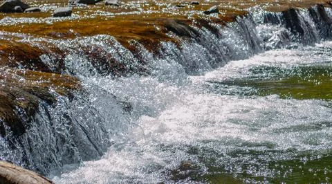 Fast flowing creek Stock Photos