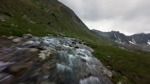 Fast flowing mountain river aerial forward movement Stock Footage 344419895